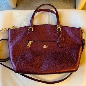 Coach leather crossbody handbag with removable straps. Burgundy metallic color